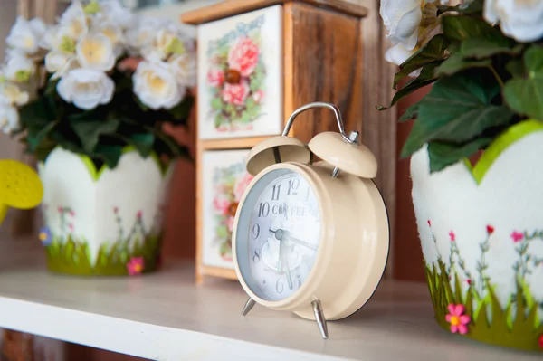 Retro alarm clock with coffee inscription inside — Stock Photo, Image