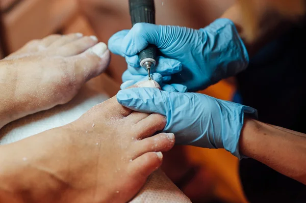 Master pedicure nails and cuticles closeup . — Stock Photo, Image