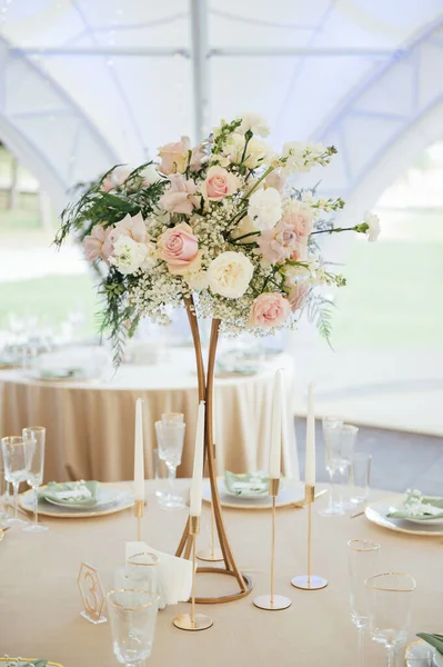 Luxury, elegant wedding reception table arrangement, floral centerpiece