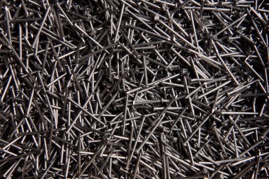 Metalik çivi bir sürü gösterilen tam çerçeve arka plan