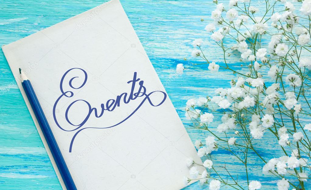 Events Inspirational quote women's hand lettering for posters writing notebook note turquoise wooden background Word refer news, current affairs, special occasions business planning