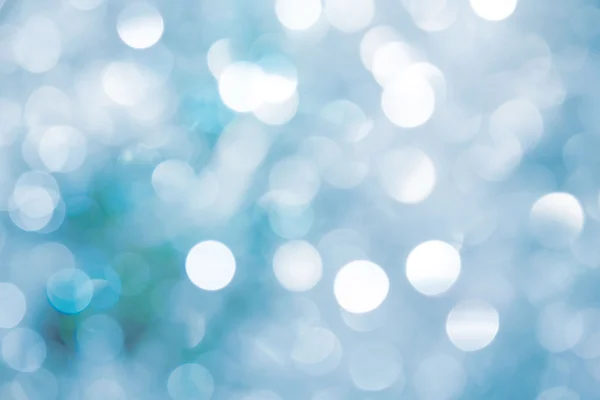 Ανάβει σε μπλε φόντο. bokeh διακοπών. Αφηρημένη. Χριστούγεννα με φόντο. Εορταστική αφηρημένα φόντο με bokeh defocused φώτα και αστέρια — Φωτογραφία Αρχείου