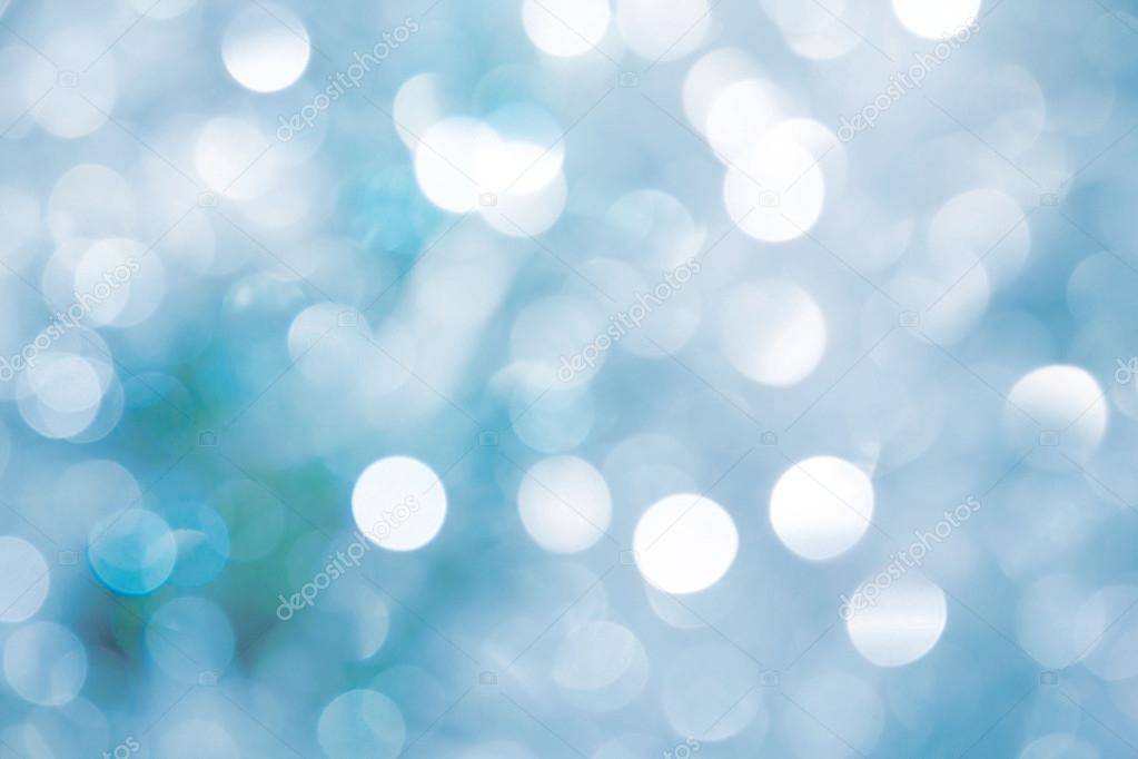 Lights on blue background. holiday bokeh. Abstract. Christmas background. Festive abstract background with bokeh defocused lights and stars