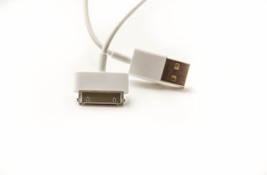 White wire usb mobile charging cable. 2 different cellphone charging plugs adapter from USB isolated on white background