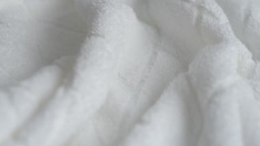 Üst görünüm tekstil arka planı. Temiz havlu dokusu. Beyaz havlu ayrıntıları..