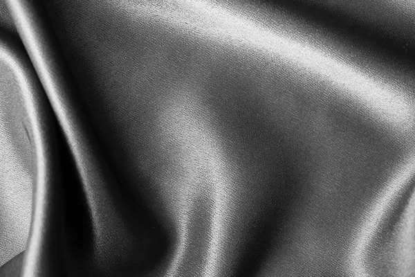 ドレープグレーの背景の抽象的な質感。美しい織物の背景です。接近中だ。トップ表示 — ストック写真