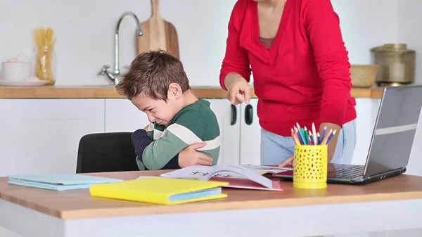 Angry serious mum lecturing lazy unmotivated schoolboy, children education problem, parent and child conflict. Stressed mother and son frustrated over failure homework. — Stock Photo, Image