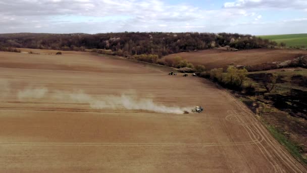 Aerial View Large Tractor Cultivating Dry Field Top Aerial View — Stock Video