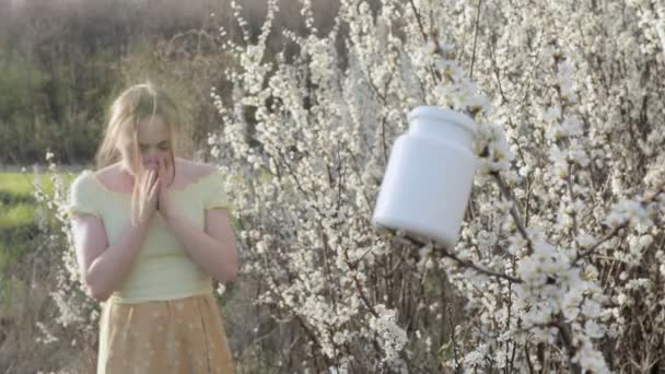 Young Woman Blowing Nose Sneezing Tissue Front Blooming Tree Seasonal — Stock Video