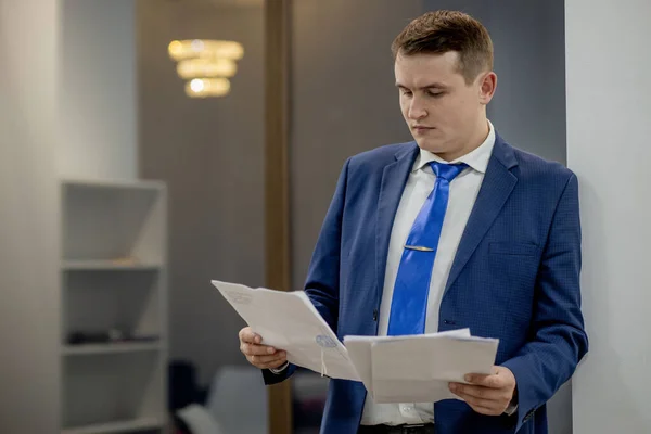 Workplace attorney success collar executive notary broker lawyer people corporate concept. Concentrated serious handsome pensive smart clever broker realtor recruiter using netbook at work.