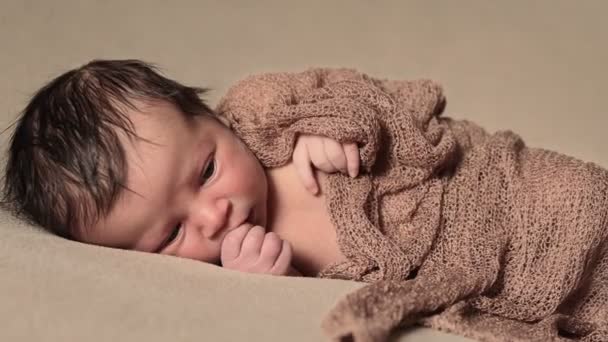 Newborn Baby Sleeping Peacefully Checkered Cloth Brown Background — Stock Video