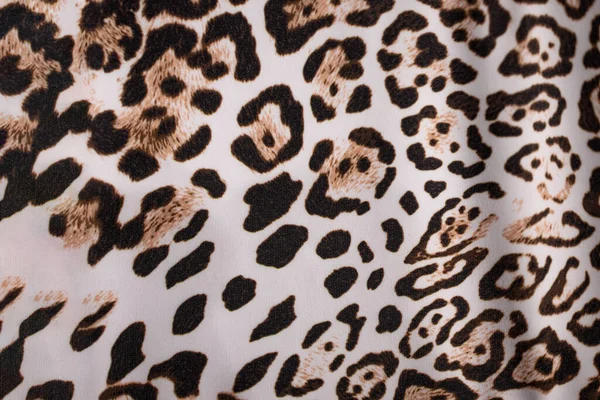Leopard fur background. Leopard skin texture. Leopard print. Background with a pattern of leopard spots, safari background, banner design
