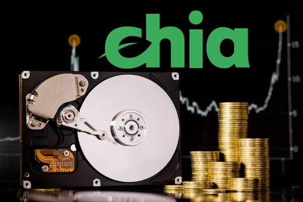 Cryptocurrency Chia and hard disk server for mining . New Crypto currency ChiaCoin virtual money concept on black background.