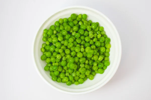 Peas into the pot — Stock Photo, Image