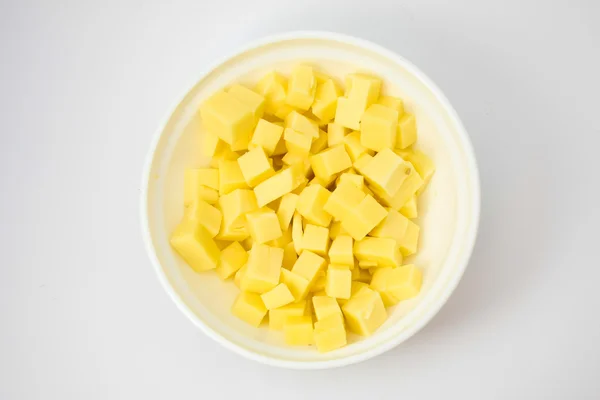 Cubos de queijo na panela — Fotografia de Stock