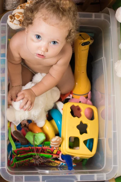 Child in a toy box