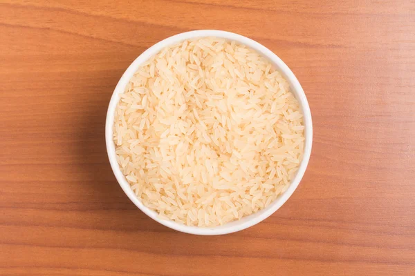 Raw Rice into a bowl