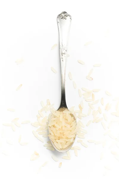 Surowy ryż do łyżki — Zdjęcie stockowe