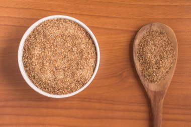 Ground Wheat into a bowl. Trigo para quibe. Kibbeh clipart