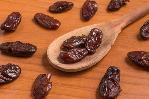 Dried Dates into a spoon. Tamara — Stock Photo, Image