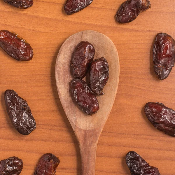 Dried Dates into a spoon. Tamara — Stock Photo, Image