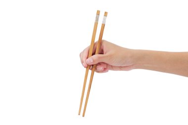 Yemek çubuklarını kullanarak ele.