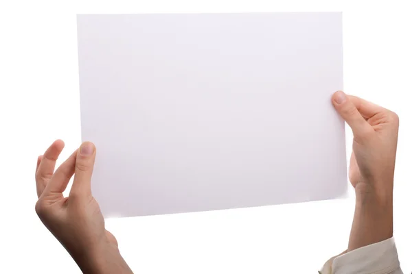 Folha de papel na mão — Fotografia de Stock