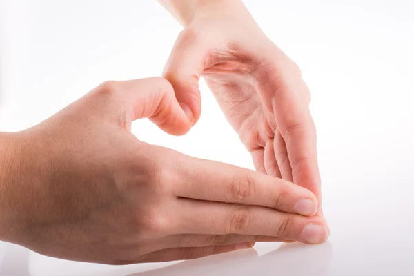 Hand making a heart — Stock Photo, Image