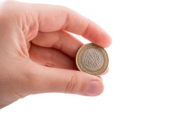 Metal Coin in hand clipart
