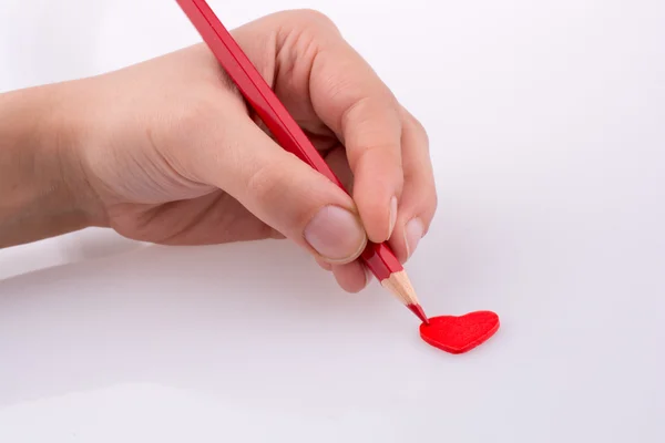 Pencil pointing a heart — Stock Photo, Image