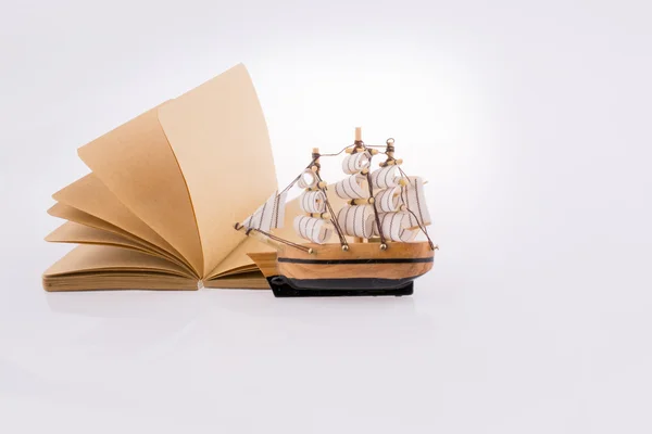 Ship on a notebook — Stock Photo, Image