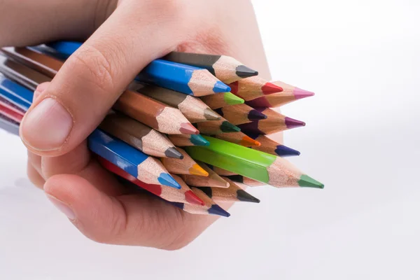 Hand holding Pencils