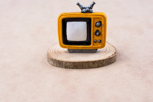 TV set on a piece of wood — Stock Photo, Image