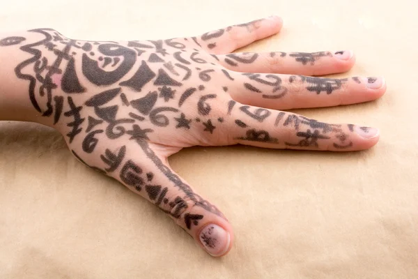 Hand with tattoo — Stock Photo, Image