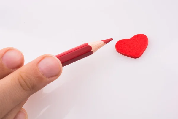 Pencil pointing a heart — Stock Photo, Image
