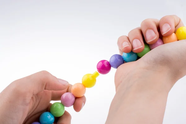 Color beads with facial expression — Stock Photo, Image