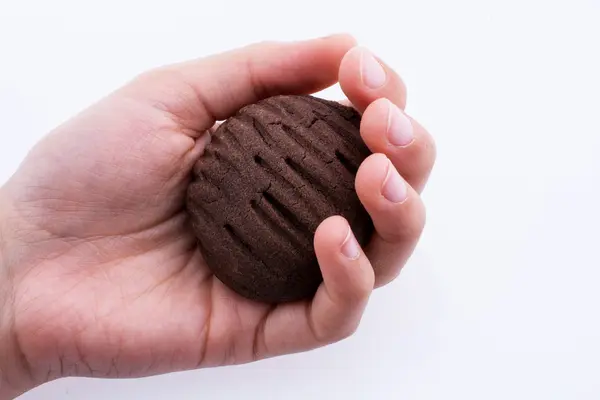 Рука тримає печиво — стокове фото