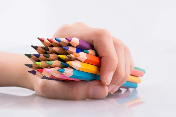 Hand hält Bleistifte — Stockfoto