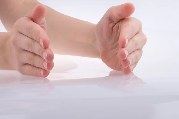 Hands making a gesture of quantity — Stock Photo, Image