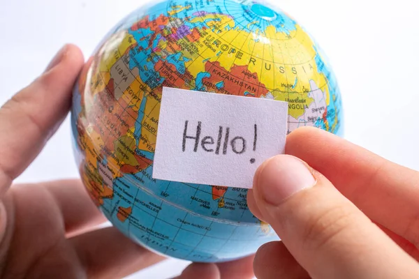 Hand Holding Notepaper Hello Wording Model Globe — Stock Photo, Image