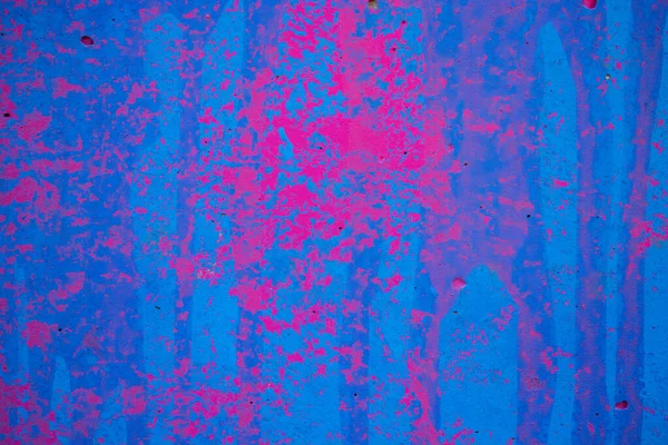 Rough colorful paint dripping  grunge texture of wall