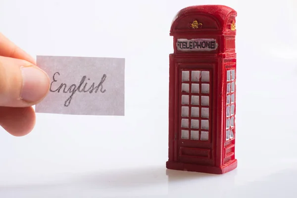 Запис Англійською Мовою Біля Британської Телефонної Будки — стокове фото