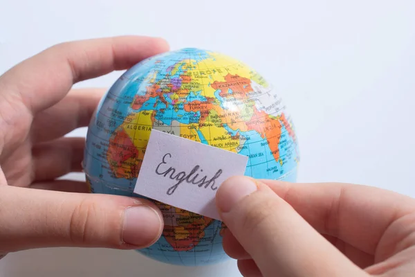 Hand Holding Notepaper Russian Wording Model Globe — стоковое фото