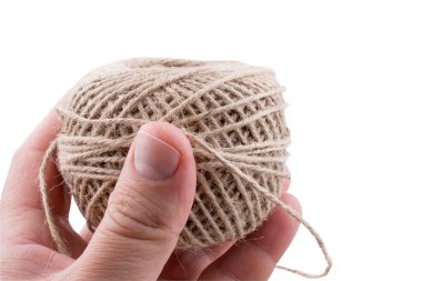 Örgü örmek için iplik. İplik yumağı. Şırınga örmek, örgü örmek, el yapımı kış kıyafetleri için iplik örmek.