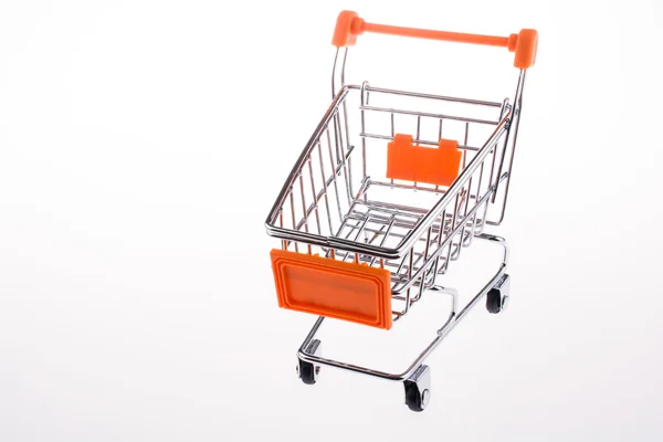 Oranssi väri ostoskori — kuvapankkivalokuva