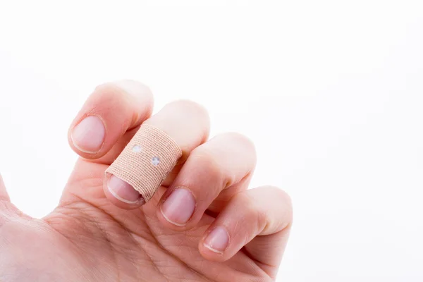 Dedo em bandagem branca — Fotografia de Stock