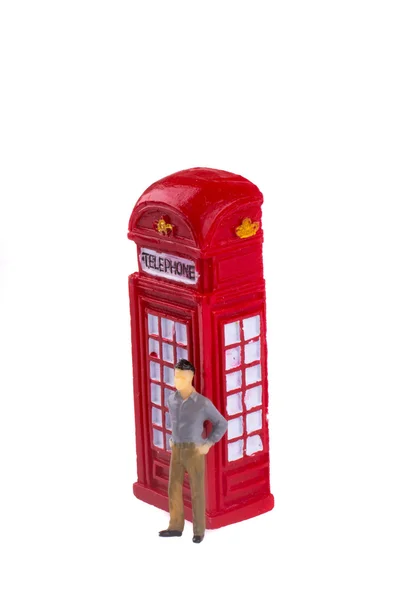 Hombre y cabina telefónica — Foto de Stock
