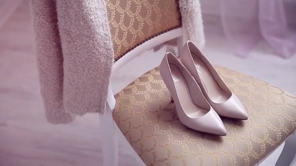Beautiful bridal shoes in sunlight — Stock Video