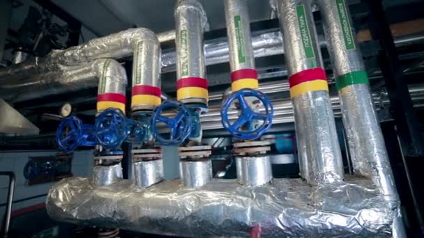 Pipe system, pipelines with valves, cranes at modern plant, factory indoor. — Stock Footage Pipe system, pipelines with valves, cranes at modern plant, factory indoor. Video Clip