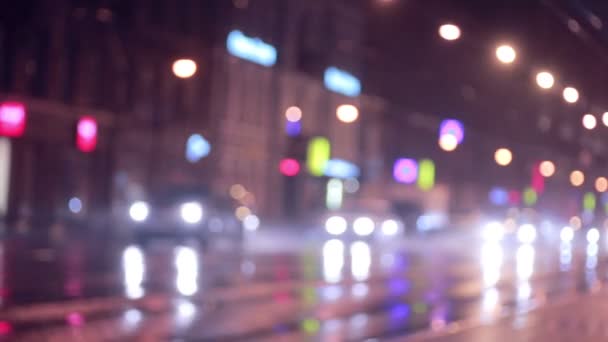 Defocused natt trafikljus. Urban bakgrund. — Stockvideo